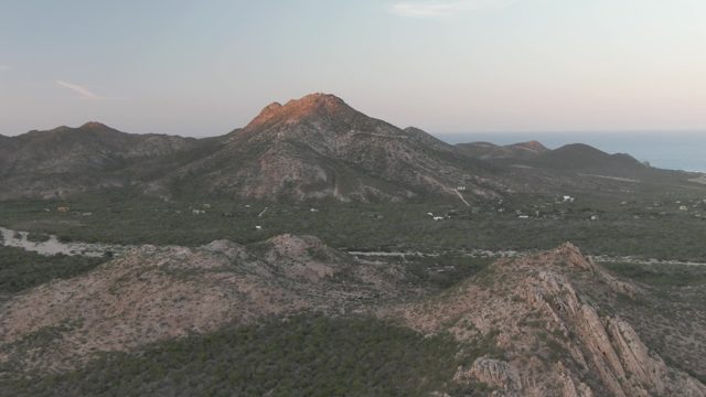 CABO PULMO BCS MEXICO-2022: Vehicle Traveling Along Road Through Mountain Valley