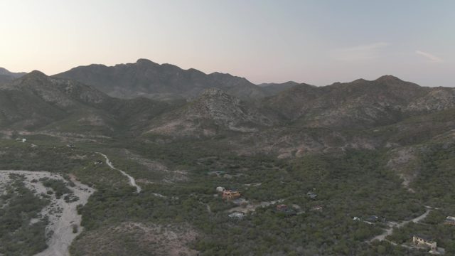 CABO PULMO BCS MEXICO-2022: Mountain Valley with Scattered Buildings and Dry Wash