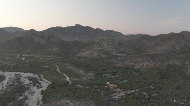 CABO PULMO BCS MEXICO-2022: Arid Mountain Valley with Dry River and Scattered Trees