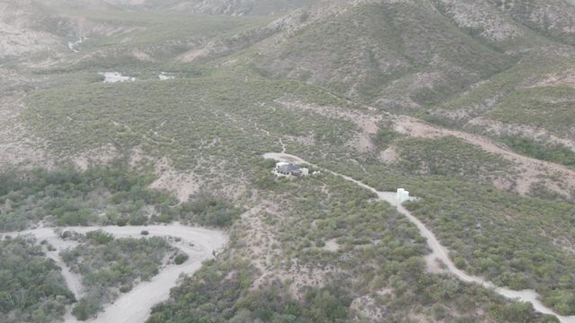 CABO PULMO BCS MEXICO-2022: Hilly Landscape with Buildings and Winding Roads