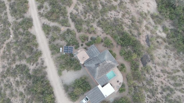CABO PULMO BCS MEXICO-2022: Car Driving on Dirt Road Past Isolated House