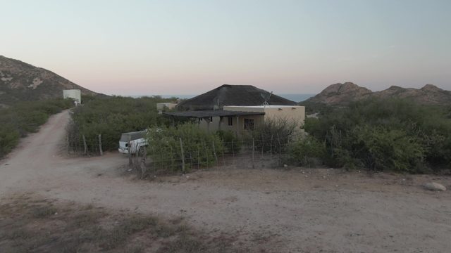 CABO PULMO BCS MEXICO-2022: Rural House Roof Construction at Dusk