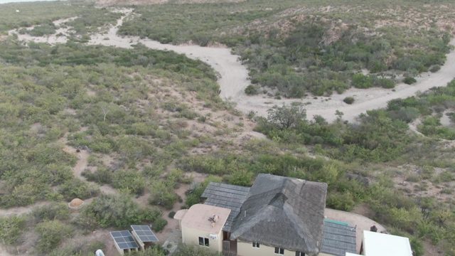 CABO PULMO BCS MEXICO-2022: House in Arid Landscape with Winding Path