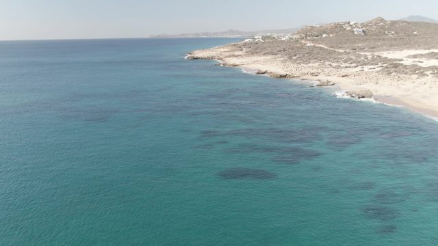 BUZZARDS EAST CAPE LOS CABOS BCS MEXICO-2022: Coastal Shoreline with Turquoise Waters and Sandy Beach