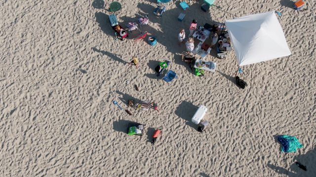 SHIPWRECKS BEACH EAST CAPE LOS CABOS BCS MEXICO-2022: Beachgoers Gathering Under a White Tent