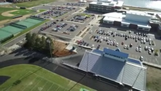 HIDDEN LAKE COLORADO-2016: Drone Flight At Altitude Over Sports Field Focusing