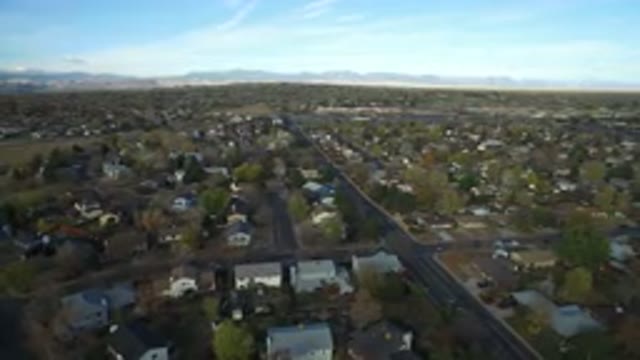 HIDDEN LAKE COLORADO-2016: Camera Panning Over A Neighborhood Showing Green