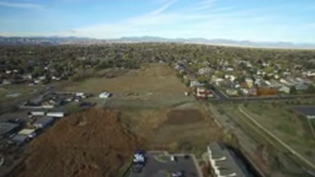 HIDDEN LAKE COLORADO-2016: Flight Over Field Green Area Trees Nature Houses Blue