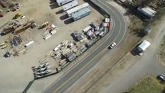 HIDDEN LAKE COLORADO-2016: Drone Overhead View Of Truck Company Courtyard Beside