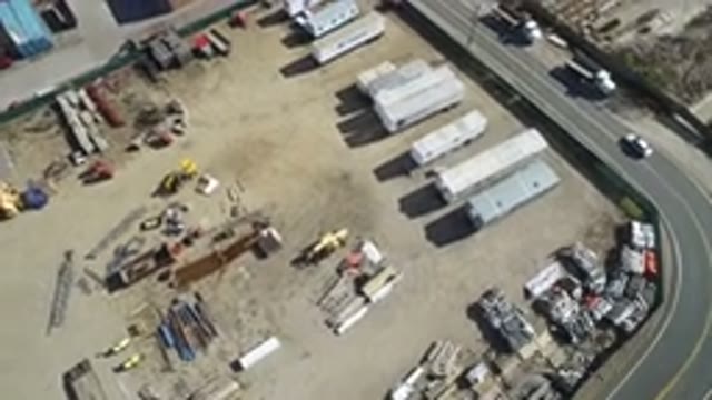 HIDDEN LAKE COLORADO-2016: Parking Of Many Bus Homes Next To An Avenue With Car