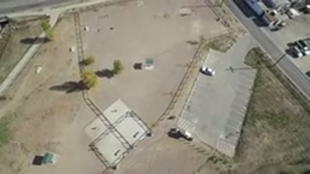 HIDDEN LAKE COLORADO-2016: A Parking Lot Lies Besides The Vacant Dry Area Of