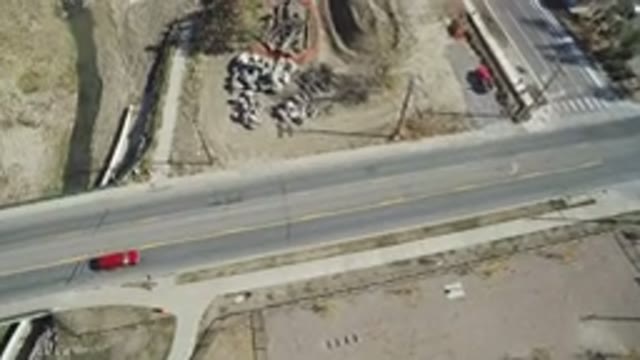 HIDDEN LAKE COLORADO-2016: Aerial View Of Highway Next To An Undeveloped Site
