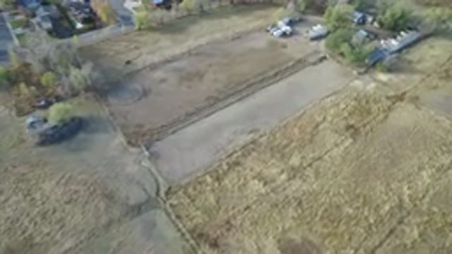 HIDDEN LAKE COLORADO-2016: An Aerial View Of Plantations, Cars, Trees And Houses