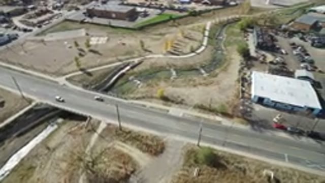 HIDDEN LAKE COLORADO-2016: Drone Overfly A Road Next To A Parking Lot And A Construction Site