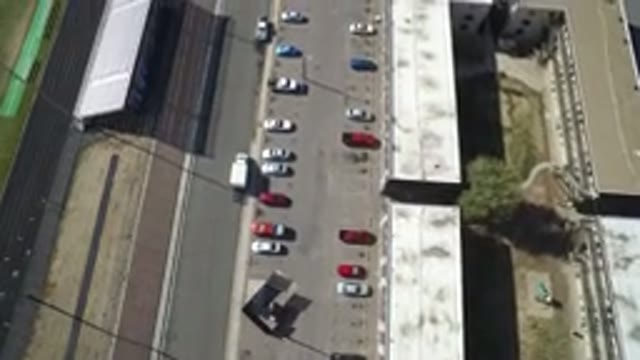 HIDDEN LAKE COLORADO-2016: Aerial View Of Parking Lot With Cars Around Buildings