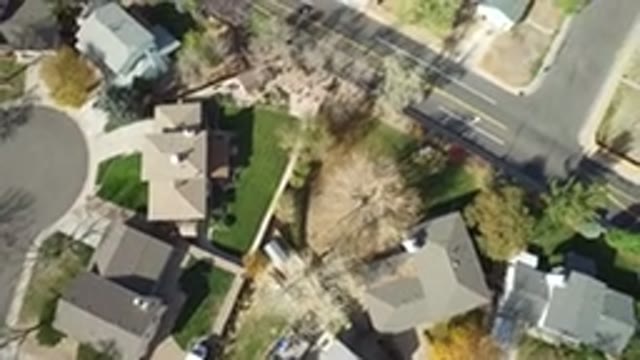 HIDDEN LAKE COLORADO-2016: Suburban Neighborhood Car Drive Through Street