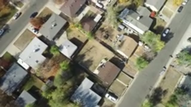 HIDDEN LAKE COLORADO-2016: A Top View Of Buildings Flowers Road And Cars In A