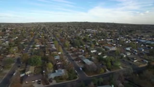 HIDDEN LAKE COLORADO-2016: A Drone Shot Of A Suburban Town During The Day
