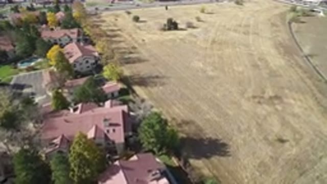HIDDEN LAKE COLORADO-2016: Airplane View Of A Rural Area With A Large Field And Houses