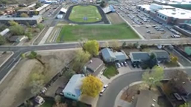 HIDDEN LAKE COLORADO-2016: The View Of A Couple Buildings And A Track Field From