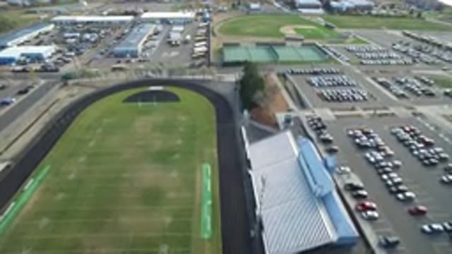 HIDDEN LAKE COLORADO-2016: Aerial View Of A Football Ground And The Parking Lots
