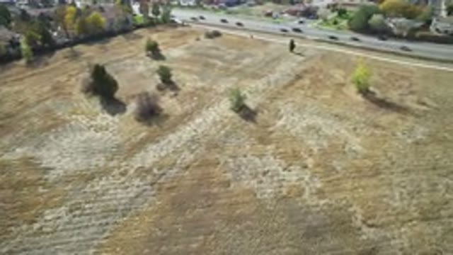 HIDDEN LAKE COLORADO-2016: Rotating Aerial Shot Of Field Next To Houses And