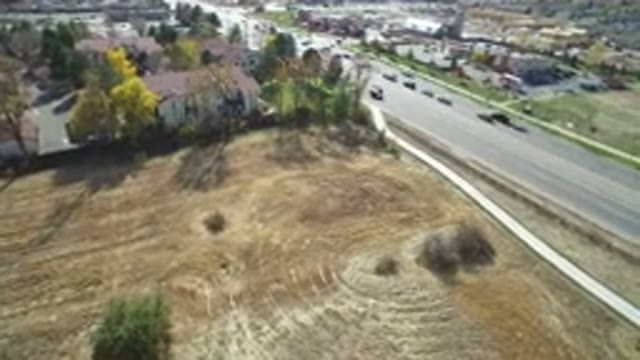 HIDDEN LAKE COLORADO-2016: Top View Of A Moving Road Next To A Set Of Houses And