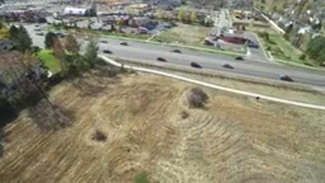HIDDEN LAKE COLORADO-2016: The Fast Moving Cars On The Highway From Above Look
