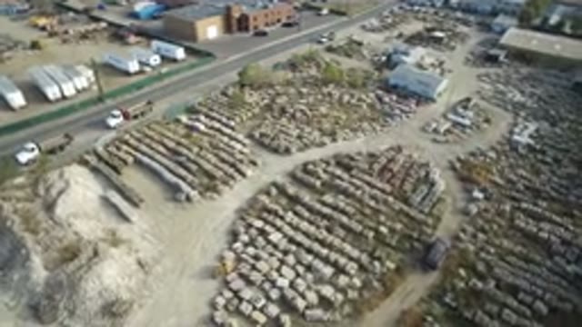 HIDDEN LAKE COLORADO-2016: Industrial Warehouse Street With Parked Trucks