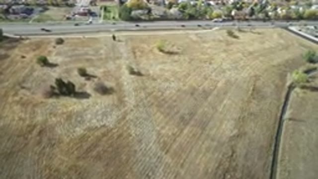 HIDDEN LAKE COLORADO-2016: A Large Two-Way Avenue Next To A Plowed And Terraced Field