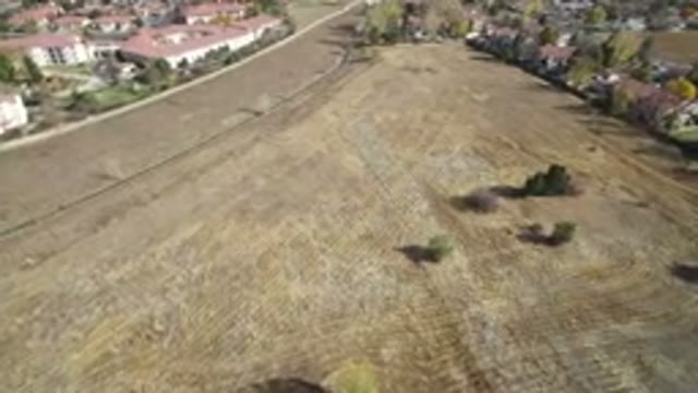 HIDDEN LAKE COLORADO-2016: Aerial View Of An Open Land Plot Near Houses On Two