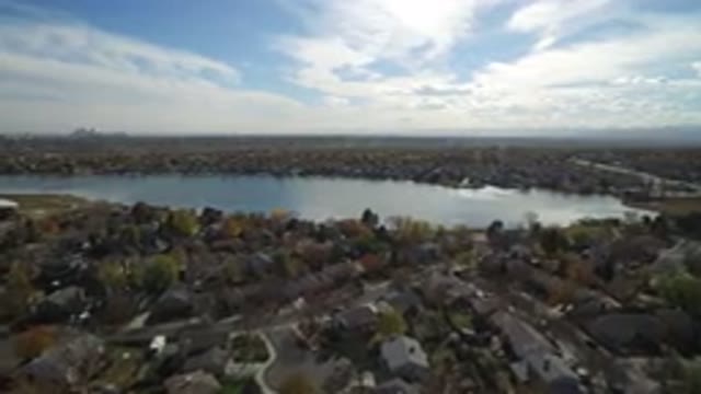 HIDDEN LAKE COLORADO-2016: Aerial View Of Houses And Trees Surrounding A Lake Of