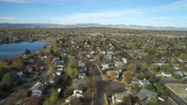 HIDDEN LAKE COLORADO-2016: Beautiful Village Filled With Green Trees On A Sunny