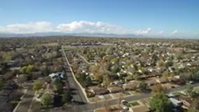 HIDDEN LAKE COLORADO-2016: A Small Town With A Summer Sky Surrounded By Dense