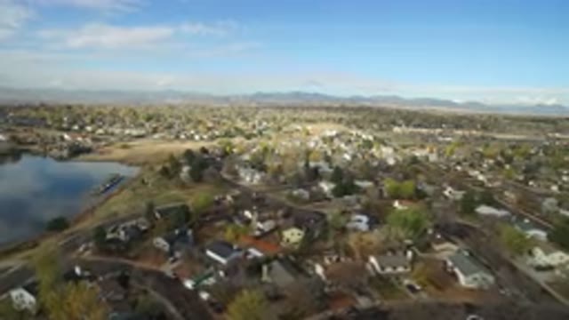 HIDDEN LAKE COLORADO-2016: An Aerial View Of Houses, Streets, Trees And Part