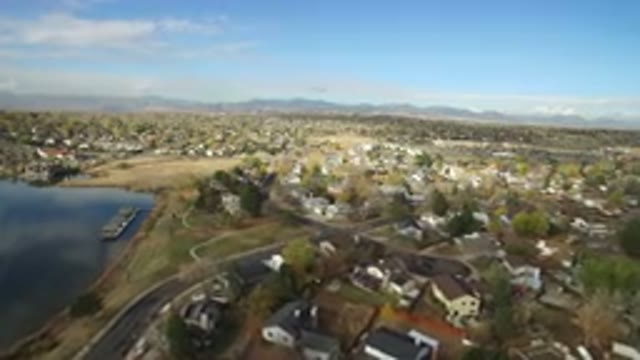 HIDDEN LAKE COLORADO-2016: Aerial View Of A Township With Houses Roads And Trees