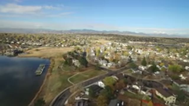 HIDDEN LAKE COLORADO-2016: Landscape Of A City Near A Lake On A Sunny Day