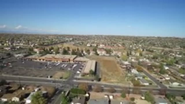 HIDDEN LAKE COLORADO-2016: Airplane View Of City Homes Preparing To Land