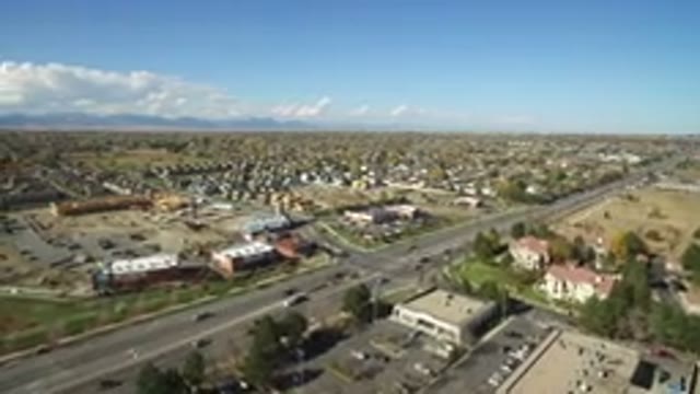 HIDDEN LAKE COLORADO-2016: Busy Area With Cars On The Roads Going To Work On