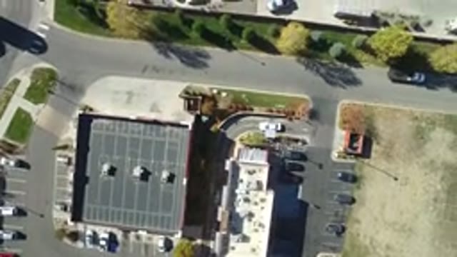 HIDDEN LAKE COLORADO-2016: Panning Bird's-Eye View Of A Building And Parking Lot