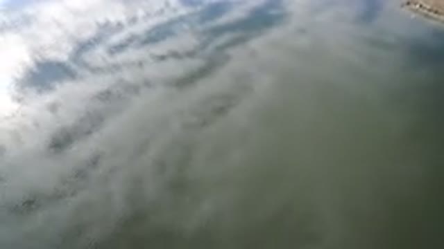 HIDDEN LAKE COLORADO-2016: Aerial View Flying Over Water That Has Reflected The