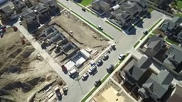 HIDDEN LAKE COLORADO-2016: An Aerial View Of A City With Lots Of Vehicles And