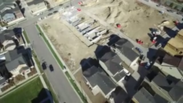 HIDDEN LAKE COLORADO-2016: Air Filming A Construction Site Rounded By Similar Buildings