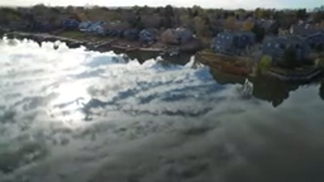 HIDDEN LAKE COLORADO-2016: An Aerial View Of A Super Clear Lake On A Semi Cloudy