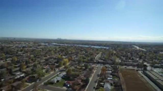 HIDDEN LAKE COLORADO-2016: Bustling City With Cars, Houses, and Trees