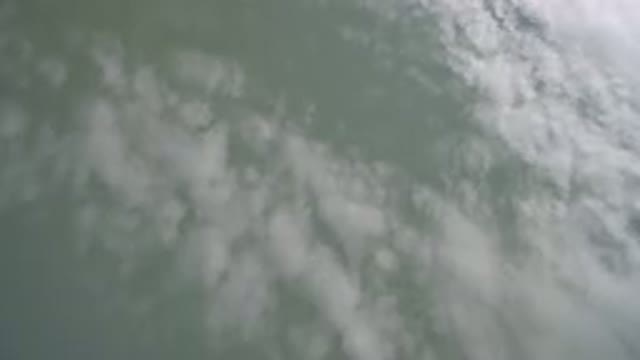 HIDDEN LAKE COLORADO-2016: Reflection Of The Sky On The Surface Of A Lake