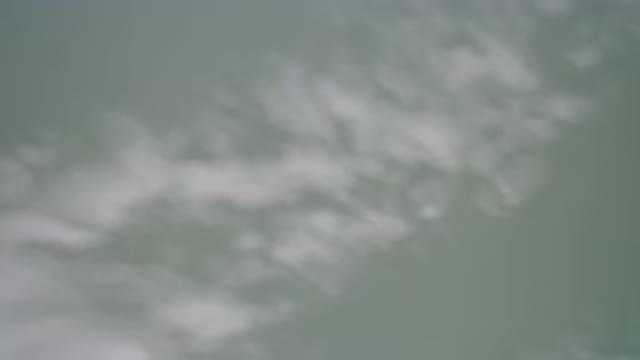 HIDDEN LAKE COLORADO-2016: Camera Moving Closely Around Jazzy Clouds