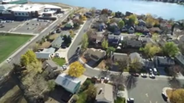 HIDDEN LAKE COLORADO-2016: Aerial View of City With Water Roads and Trees