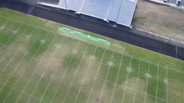 HIDDEN LAKE COLORADO-2016: Aerial View Of An Empty Green Football Field