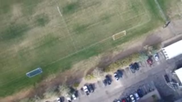 HIDDEN LAKE COLORADO-2016: Cars Of Different Colors Parked Beside A Mon Lawn